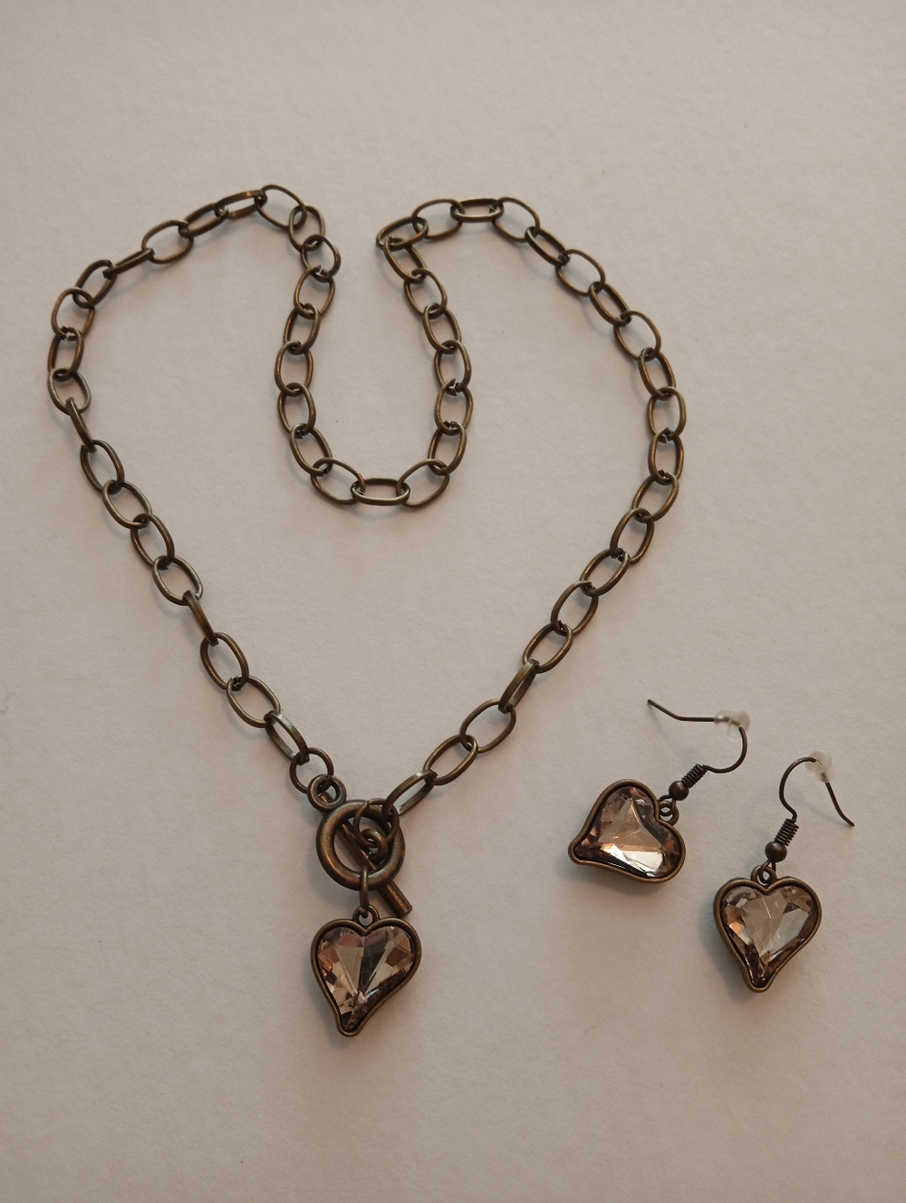#1229.  Brass Toned Rhinestone Heart Toggle Closure Necklace & Heart Earring Set